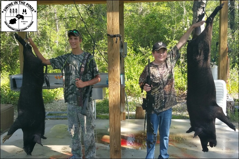 Briar and Joseph with their Monsters - 150lb and 180lb Boars at Swine In The Pines