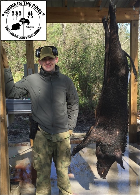 James Wallis took this awesome Hog using a Kel Tec Bullpup .223! at Swine In The Pines