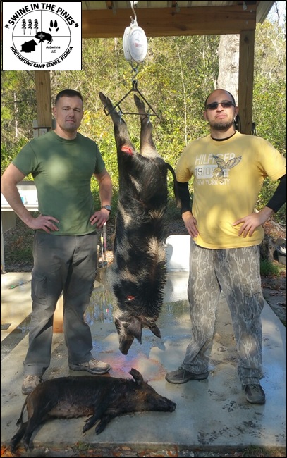 Kurt and Gustavo after a Spear Hunt at Swine In The Pines Hog Hunting Camp