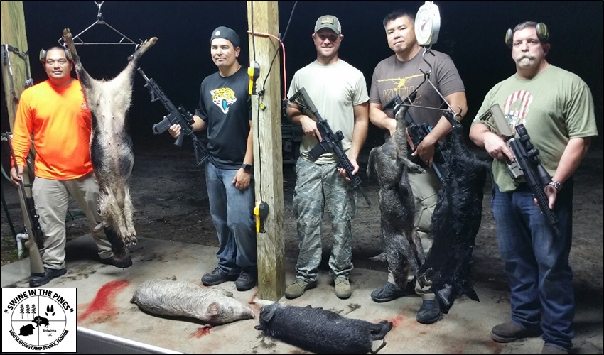 Nes, David, Jeremy, Jacques, and Tim took these Wild Hogs at Swine In The Pines in Northeast Florida