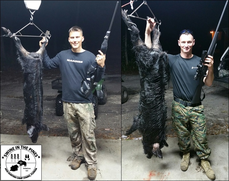 SGT Peter Kam and SGT Joseph Roy with their two nice Hogs at Swine In The Pines