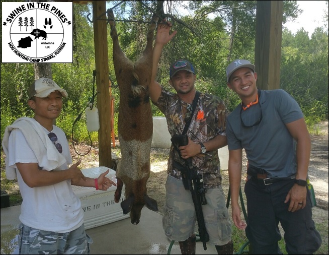 Ron, Jazon, and John at Swine In The Pines Hog Hunting Camp
