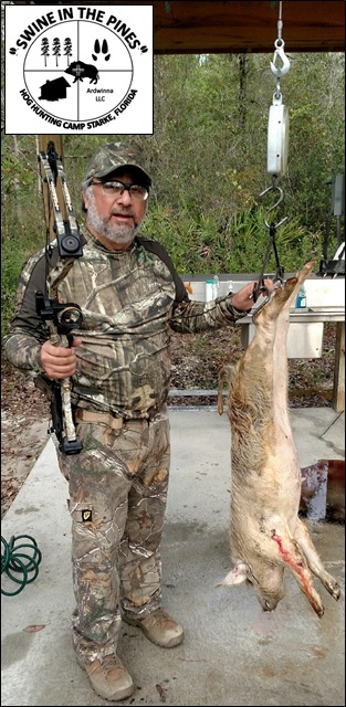 Simon took this nice Wild Hog during a Bow Hunt at Swine In The Pines Hog Hunting Camp in Starke, Florida